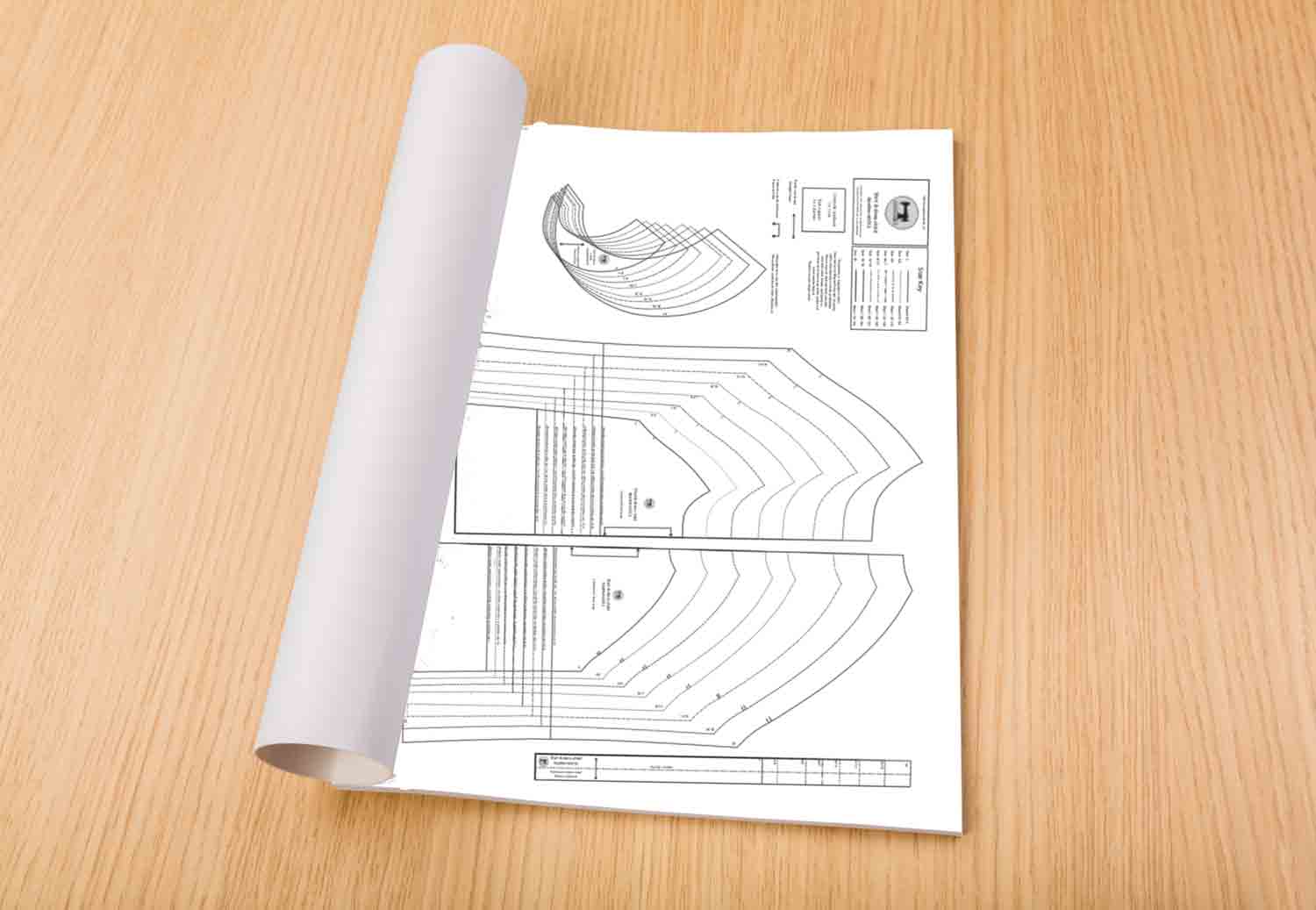 A0 pattern on a wooden table PDF sewing pattern printing